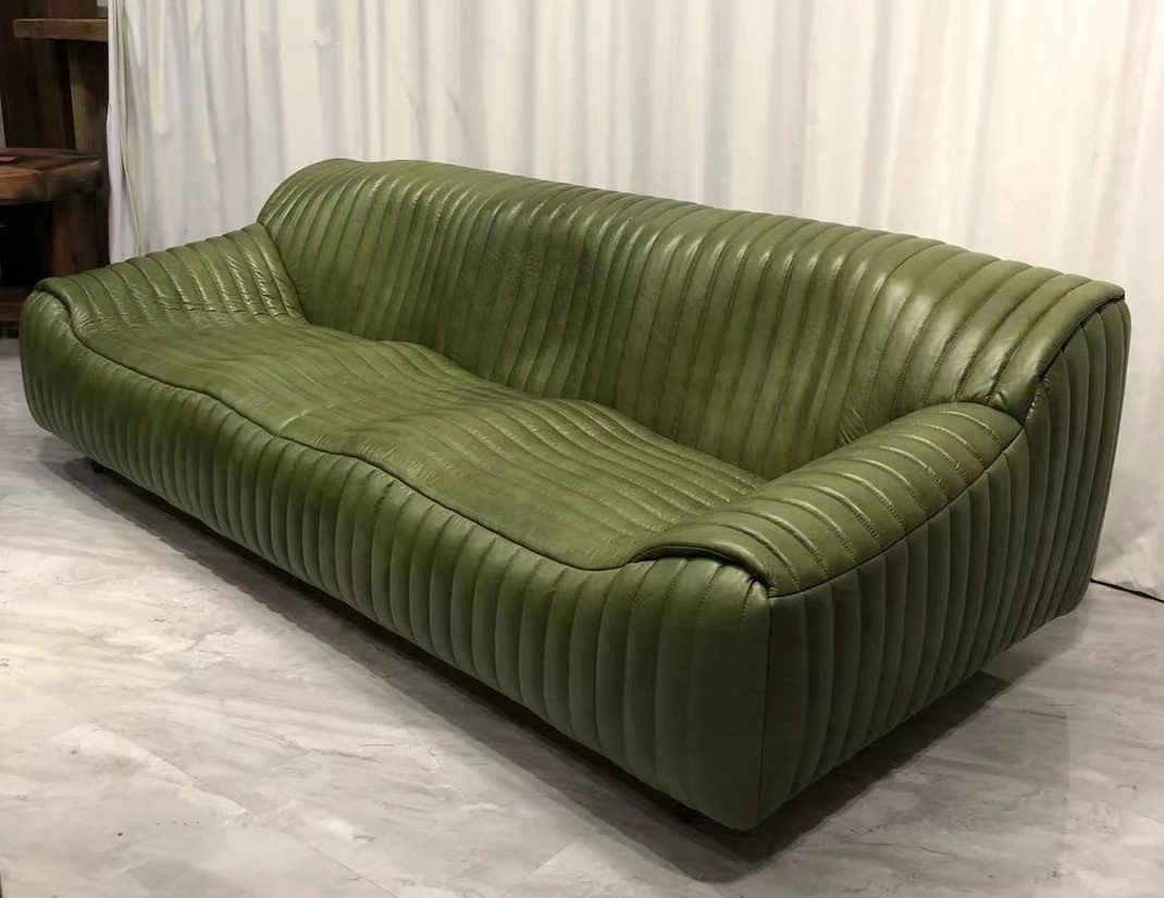 antique green leather sofa
