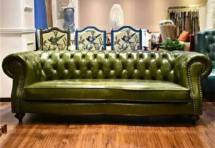 Green chesterfield sofa