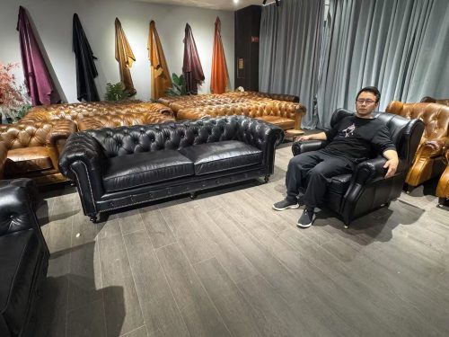 black leather sofa chesterfield