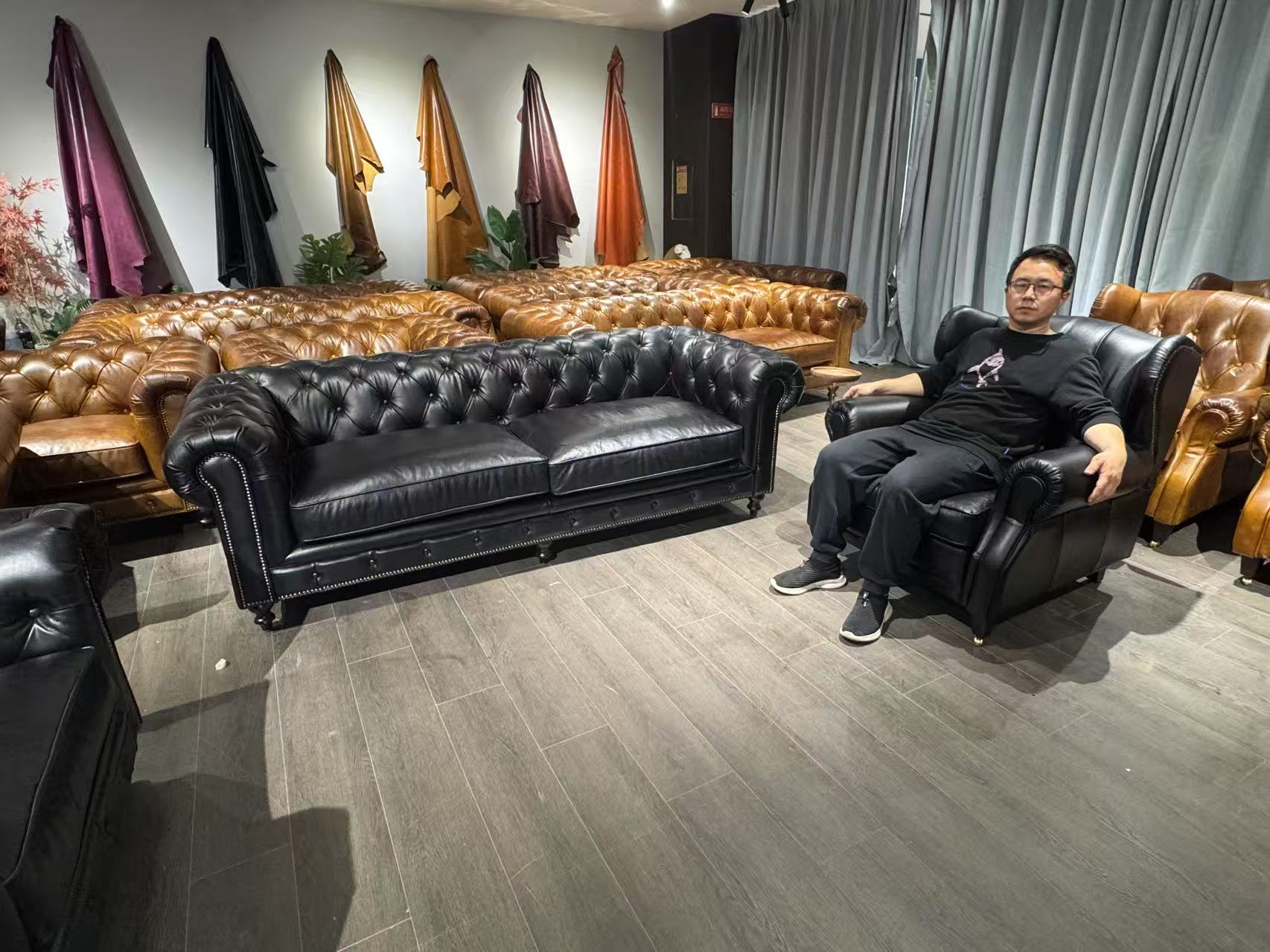 black leather sofa chesterfield